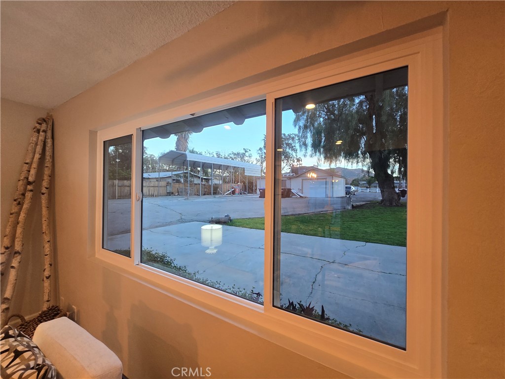 607 Sixth Street Norco, CA 92860 - Photo 26 of 31 a view of a porch with a floor to ceiling window