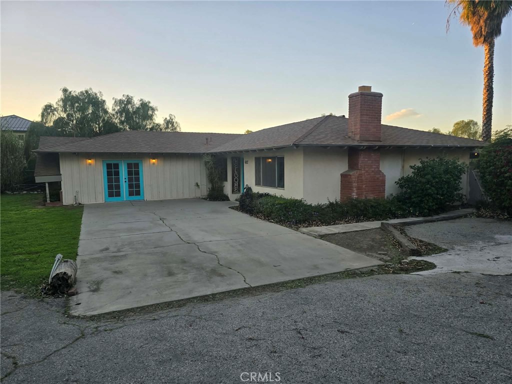 607 Sixth Street Norco, CA 92860 - Photo 29 of 31 front view of a house with a yard