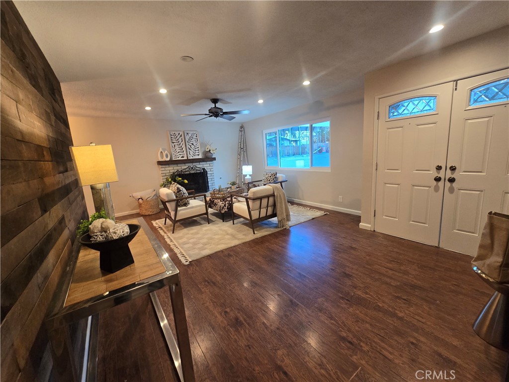 607 Sixth Street Norco, CA 92860 - Photo 5 of 31 a living room with furniture and a wooden floor