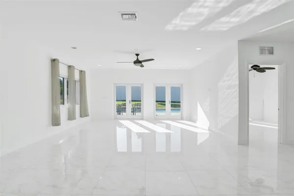 $12,000 | 26 Cayuga Road, Sea Ranch Lakes, FL 33308