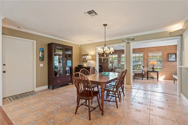 a spacious bathroom with cabinets a sink and a window
