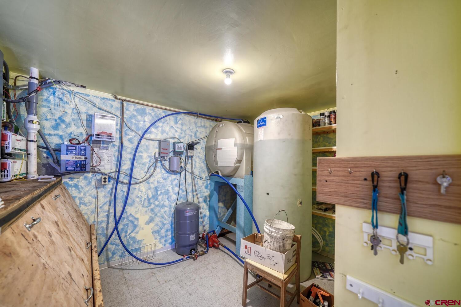 741 Wolfe Road Hartsel, CO 80449 - Photo 32 of 45 a bathroom with a sink and mirror with painted walls