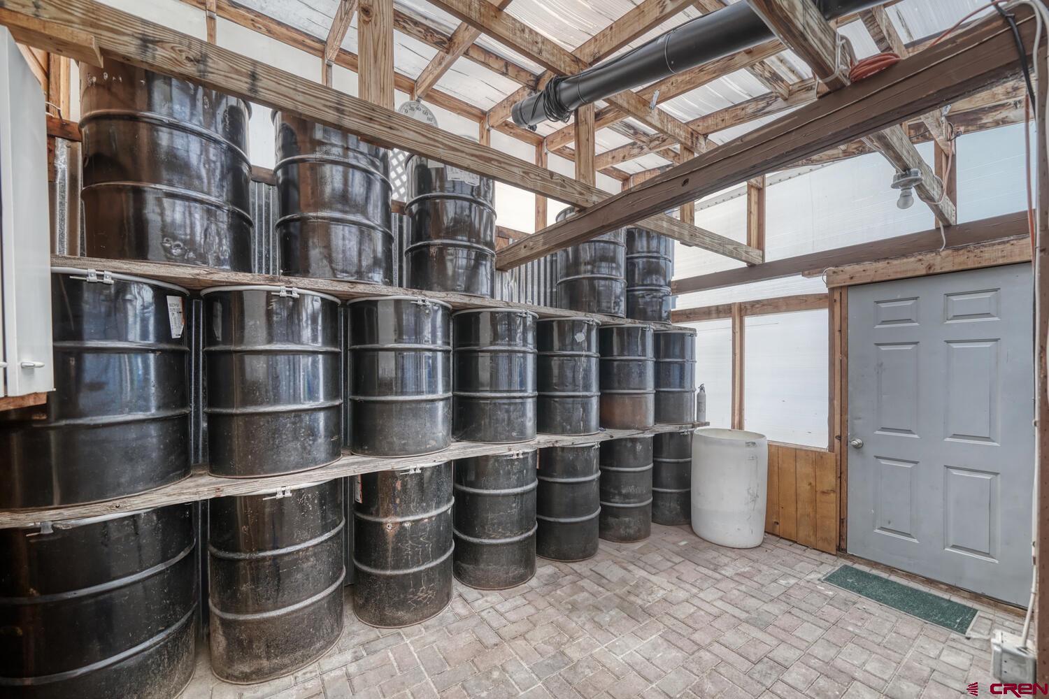 741 Wolfe Road Hartsel, CO 80449 - Photo 35 of 45 a room with shelves and wooden shelves