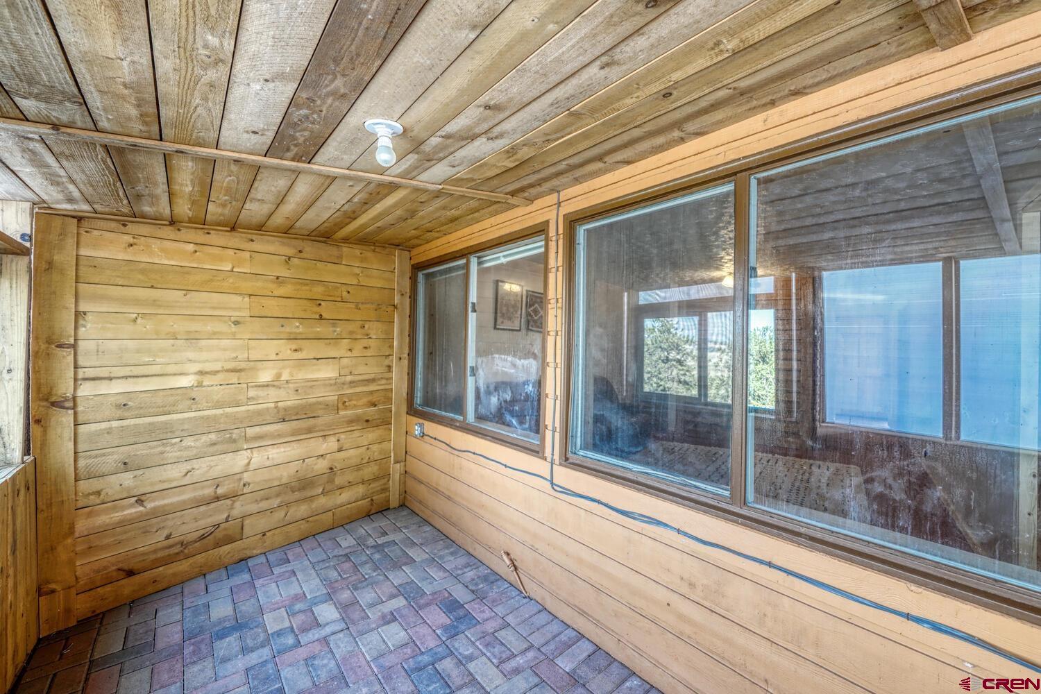 741 Wolfe Road Hartsel, CO 80449 - Photo 37 of 45 a view of a door and wooden floor