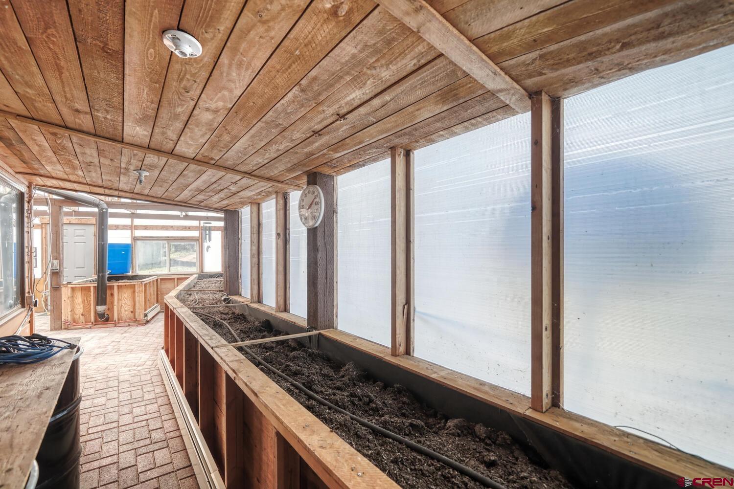 741 Wolfe Road Hartsel, CO 80449 - Photo 38 of 45 a kitchen with stainless steel appliances granite countertop a sink and a stove