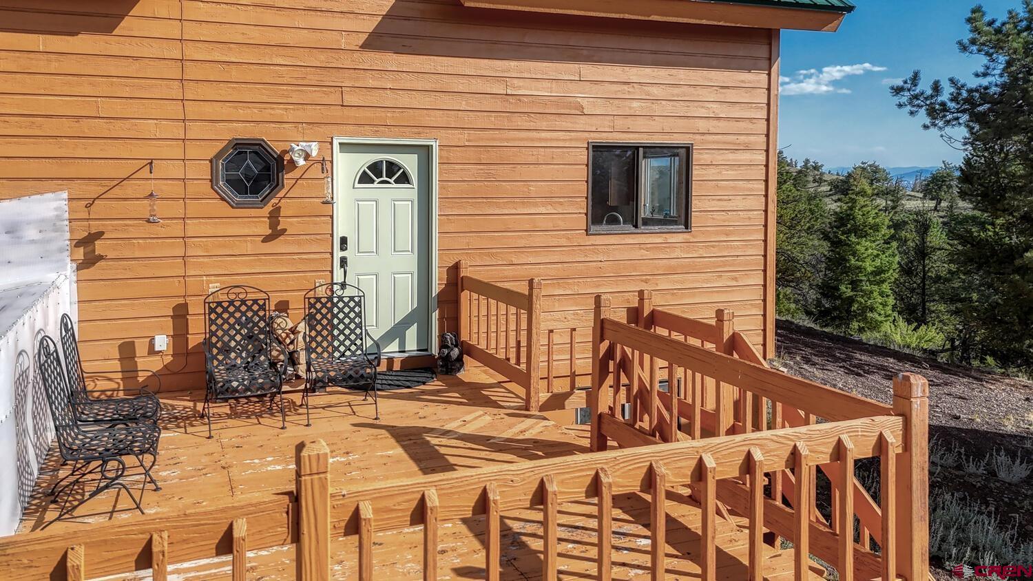 741 Wolfe Road Hartsel, CO 80449 - Photo 4 of 45 a view of front door and porch