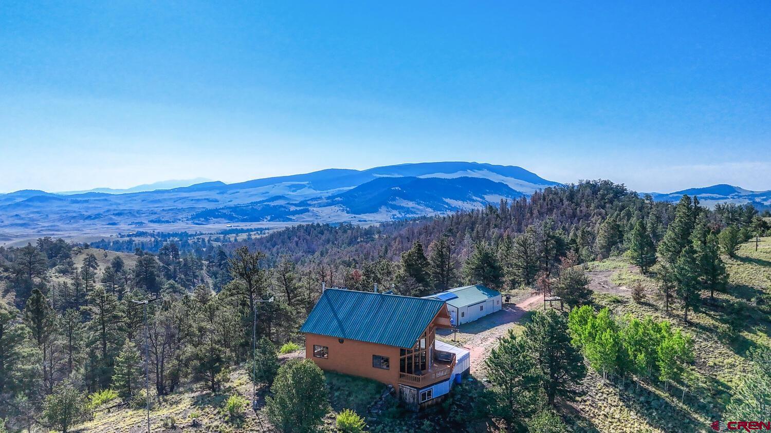 741 Wolfe Road Hartsel, CO 80449 - Photo 45 of 45 an aerial view of residential house and sandy dunes