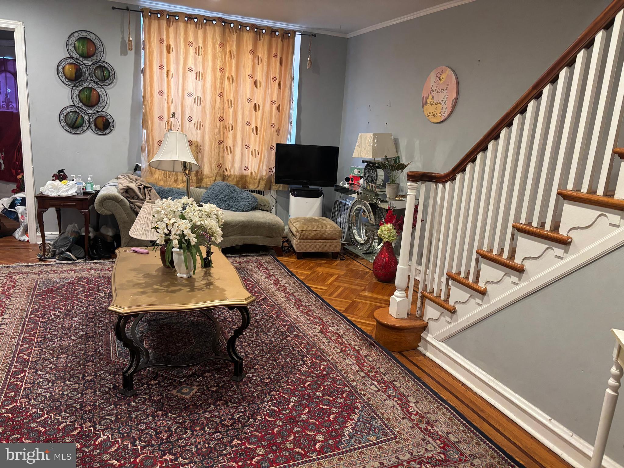 1615 Mayland Street Philadelphia, PA 19138 - Photo 2 of 13 a living room with furniture and a flat screen tv