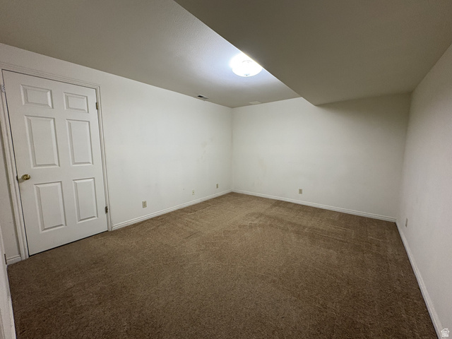 486 West 120 North Orem, UT 84057 - Photo 21 of 30 Spacious room with plush brown carpeting, crisp white walls, and a recessed ceiling light fixture