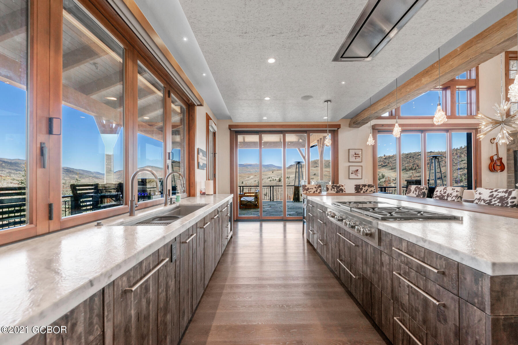 40 County Road Tabernash, CO 80478 - Photo 24 of 89 Kitchen surrounded by windows