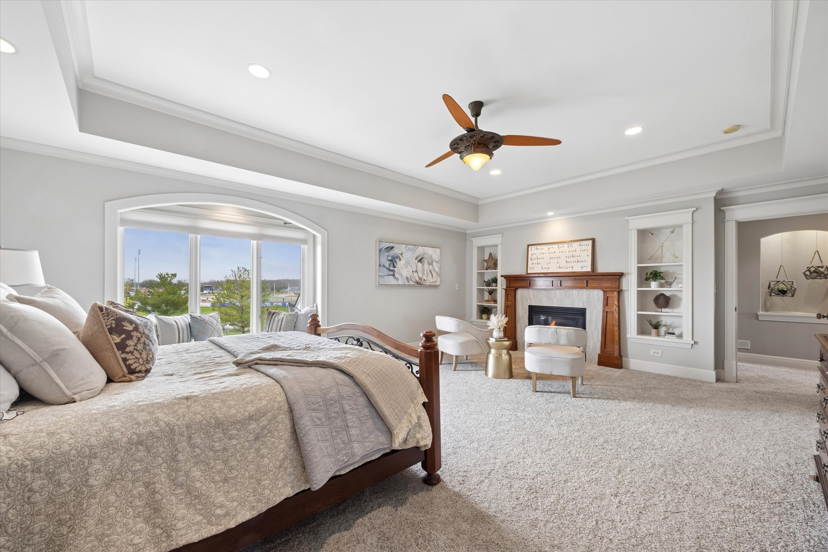 521 River Ridge Drive St. Charles, IL 60175 - Photo 19 of 46 a spacious bedroom with a large bed couch and a window