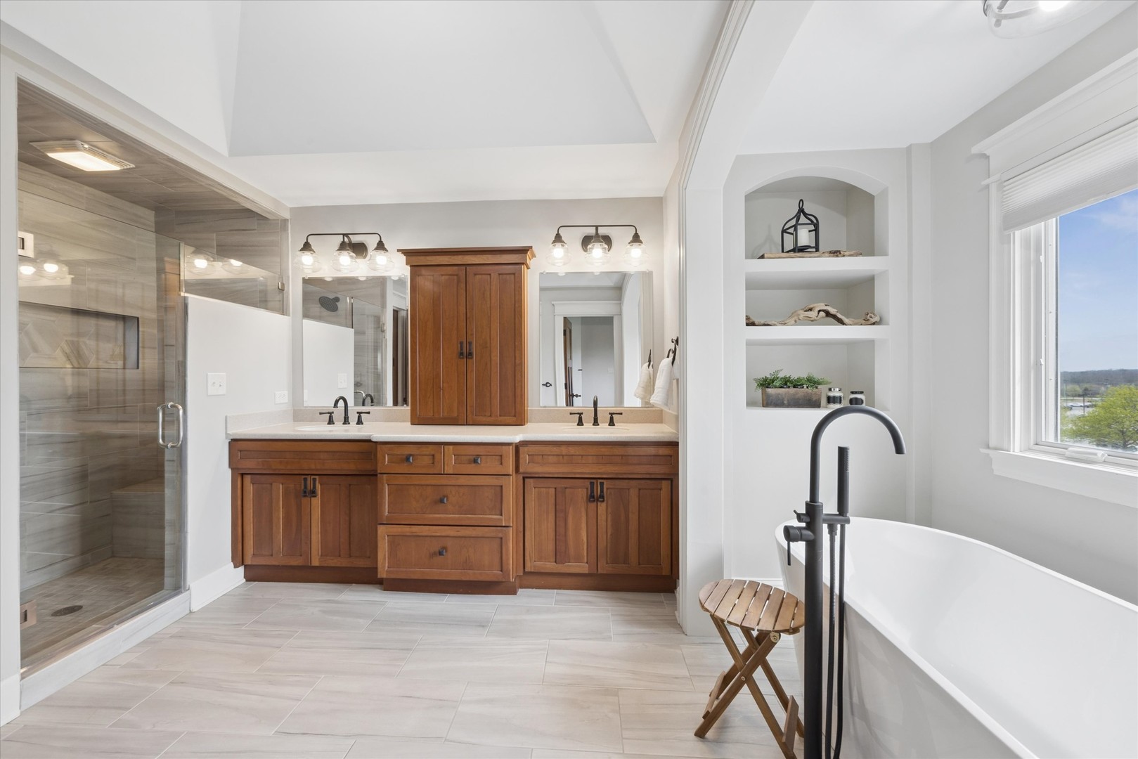 521 River Ridge Drive St. Charles, IL 60175 - Photo 20 of 46 a bathroom with a sink mirror and a bathtub