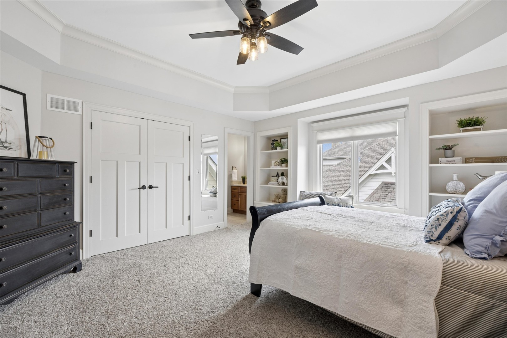 521 River Ridge Drive St. Charles, IL 60175 - Photo 23 of 46 a bedroom with a bed and a chandelier