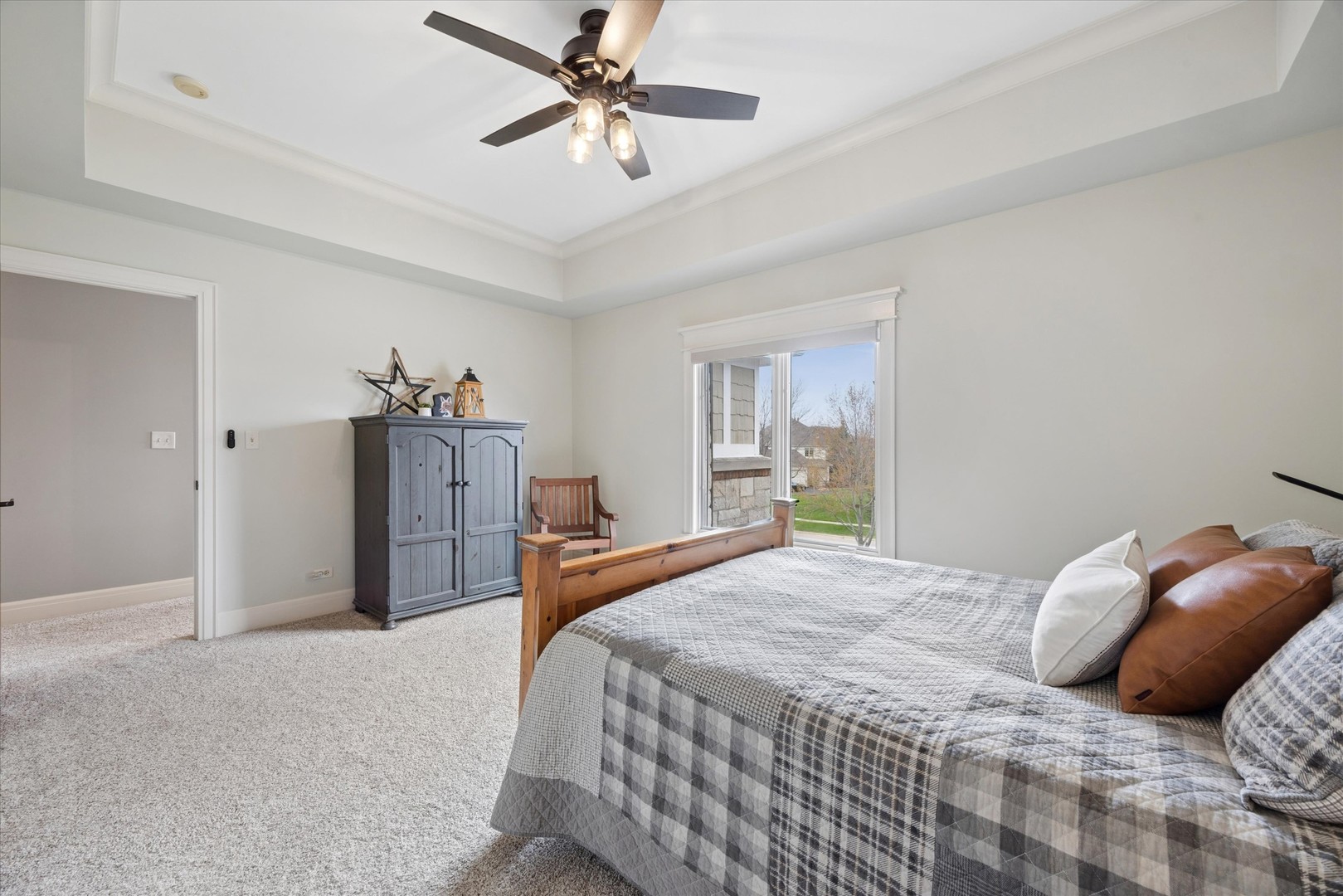521 River Ridge Drive St. Charles, IL 60175 - Photo 27 of 46 a bedroom with a bed and a chandelier