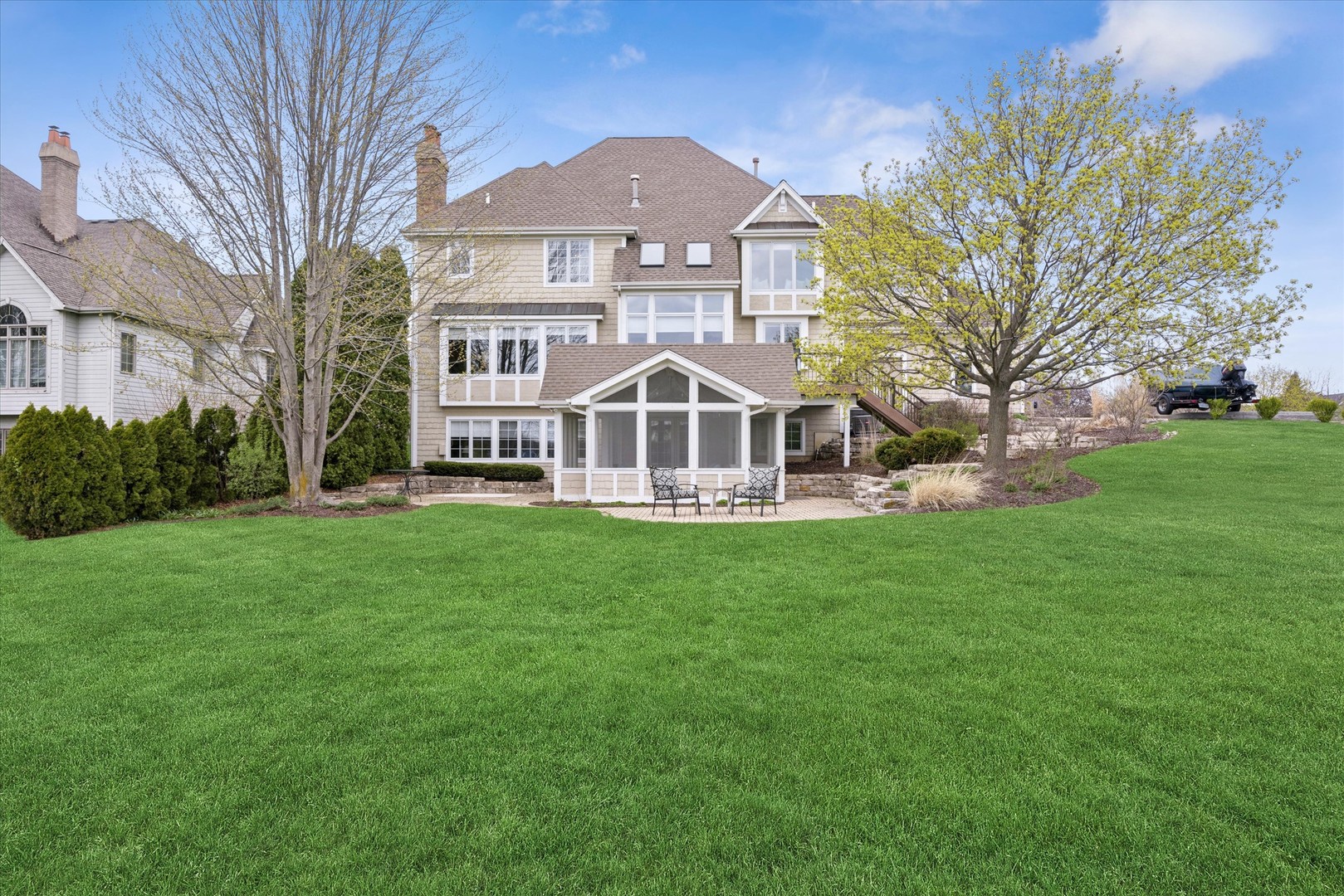 521 River Ridge Drive St. Charles, IL 60175 - Photo 35 of 46 a front view of a house with a garden
