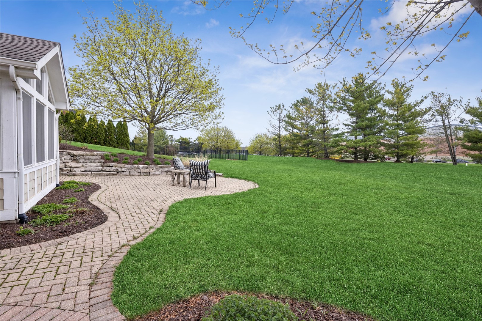 521 River Ridge Drive St. Charles, IL 60175 - Photo 36 of 46 a view of a backyard with sitting area