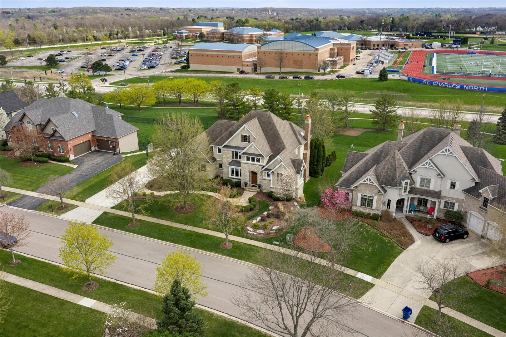 521 River Ridge Drive St. Charles, IL 60175 - Photo 40 of 46 an aerial view of a house with a garden and lake view