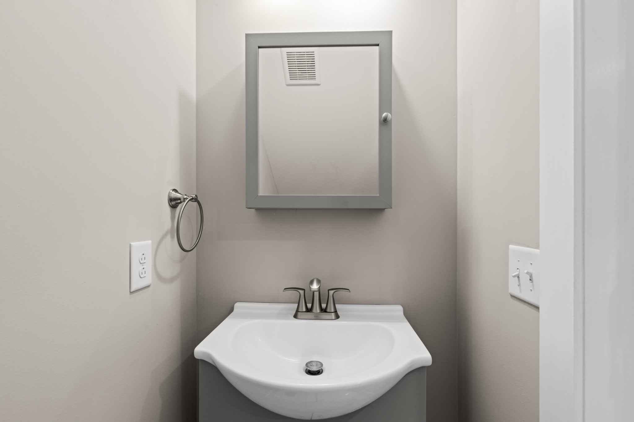 115 North Adams Street Adams, TN 37010 - Photo 13 of 44 a bathroom with a sink and mirror