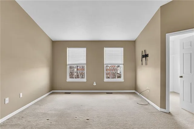 an empty room with windows