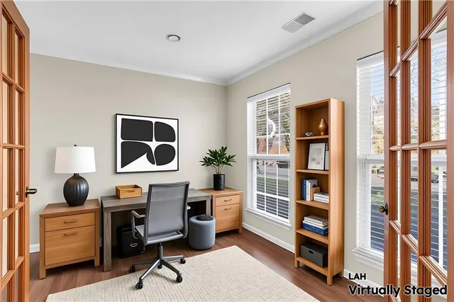 a workspace with furniture and window