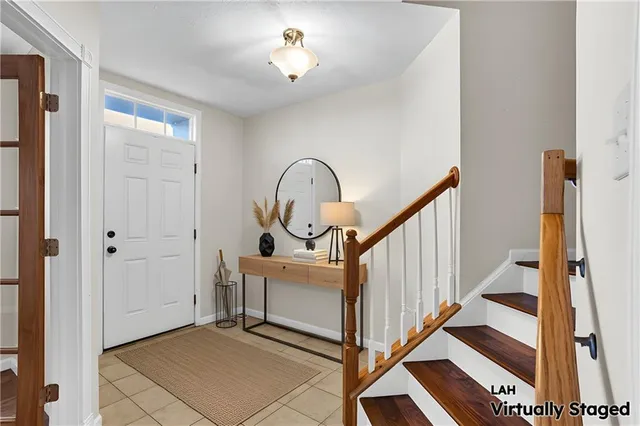 a view of a hallway with staircase