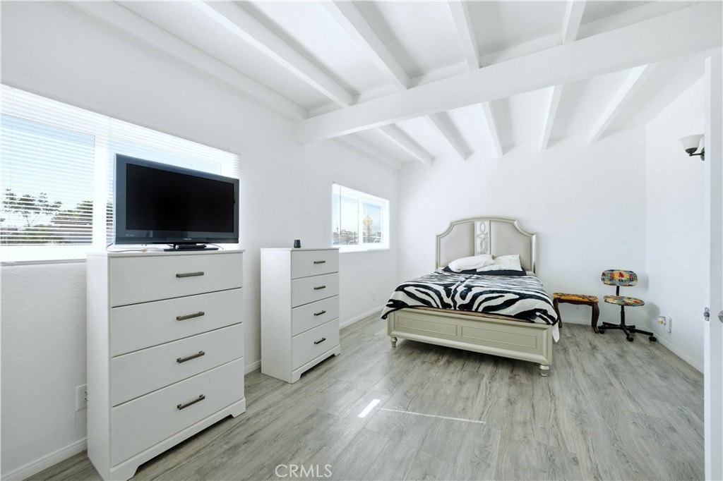 1619 West 163rd Street Compton, CA 90220 - Photo 12 of 36 a living room with furniture and a flat screen tv