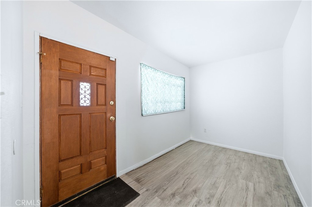1619 West 163rd Street Compton, CA 90220 - Photo 4 of 36 an empty room with windows