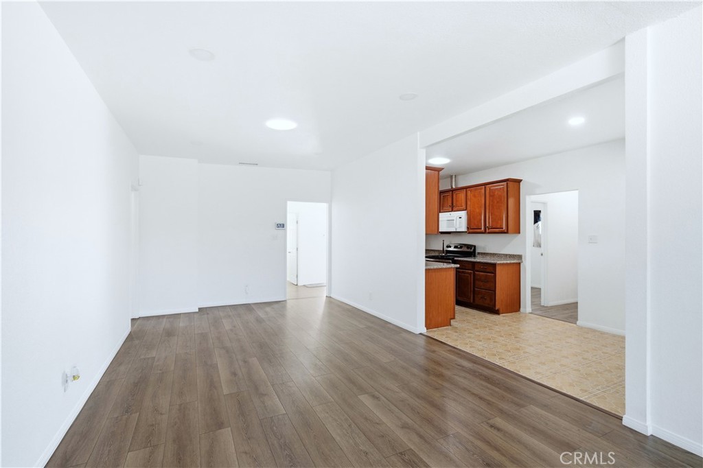 1619 West 163rd Street Compton, CA 90220 - Photo 7 of 36 a view of kitchen with sink and wooden floor