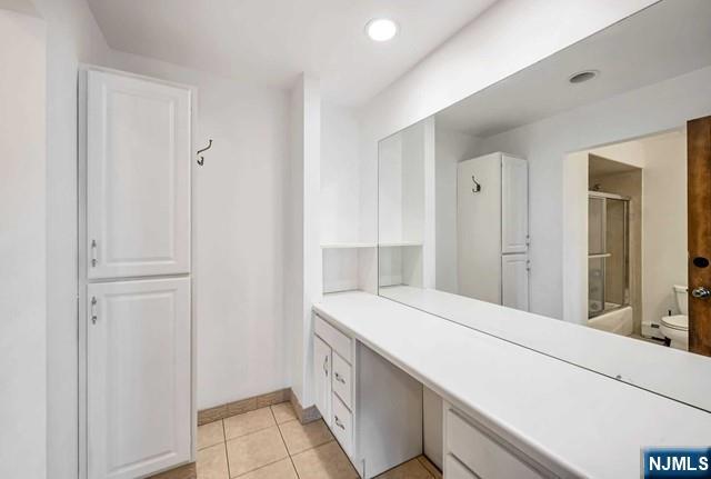 40 Ridge Road, Unit 1 Ridgewood, NJ 07450 - Photo 20 of 26 a room with a sink and cabinets