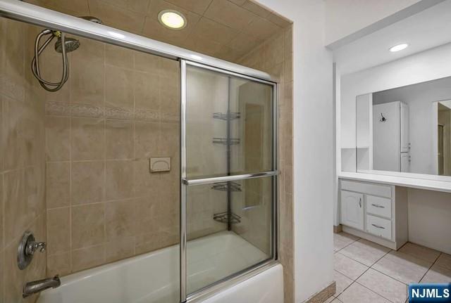40 Ridge Road, Unit 1 Ridgewood, NJ 07450 - Photo 22 of 26 a bathroom with a glass shower door
