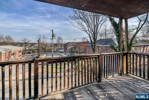 a view of a street from a balcony