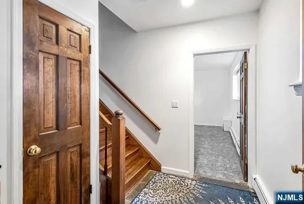 a view of an entryway with staircase