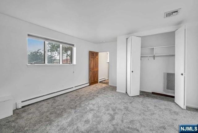 40 Ridge Road, Unit 1 Ridgewood, NJ 07450 - Photo 6 of 26 a view of an empty room with a window