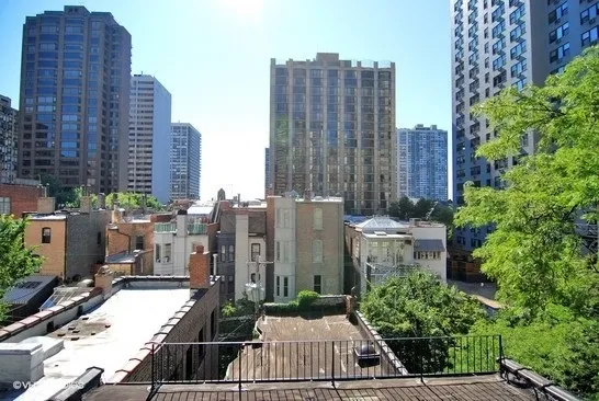 a view of a city with tall buildings