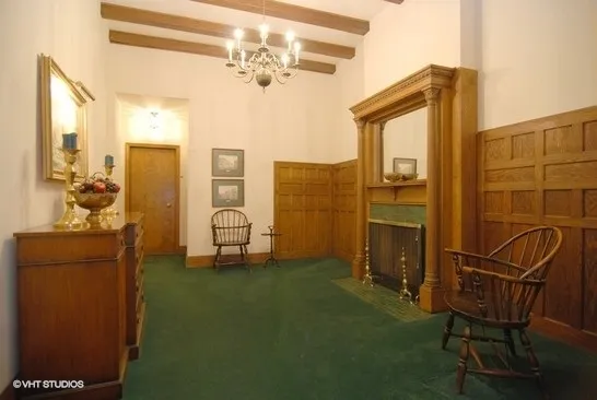 a view of a livingroom with furniture and front door