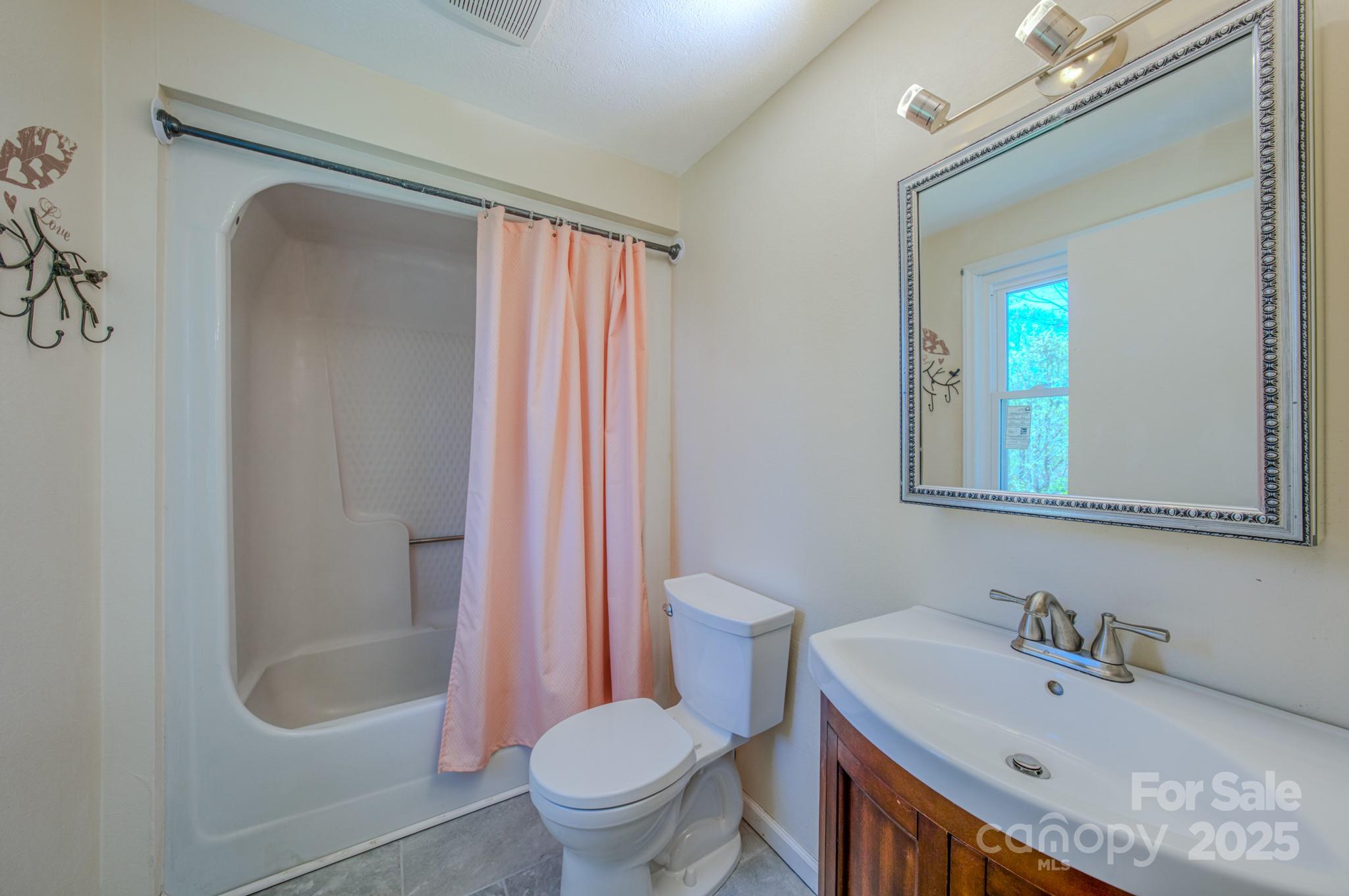 280 Fletcher View Drive Fletcher, NC 28732 - Photo 25 of 40 a bathroom with a sink a toilet and shower