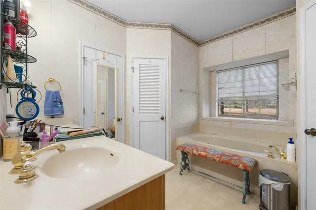 a view of a backyard with swimming pool