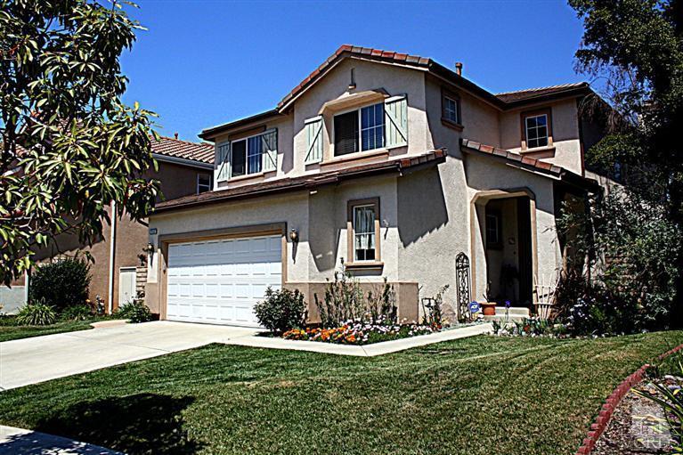 968 Roldan Avenue Simi Valley, CA 93065 - Photo 1 of 20 a front view of a house with a yard