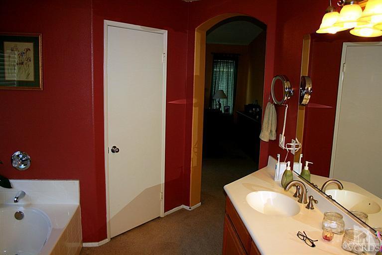 968 Roldan Avenue Simi Valley, CA 93065 - Photo 13 of 20 a bathroom with a sink and a mirror