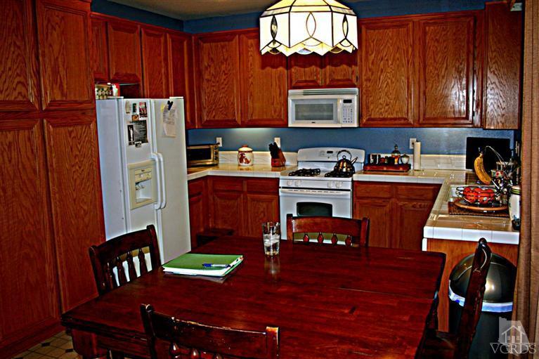 968 Roldan Avenue Simi Valley, CA 93065 - Photo 7 of 20 a view of a dining room with furniture and chandelier