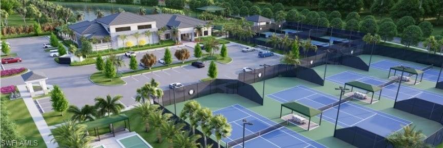 12760 Springbrook Court Estero, FL 33928 - Photo 11 of 17 an aerial view of multiple houses with yard