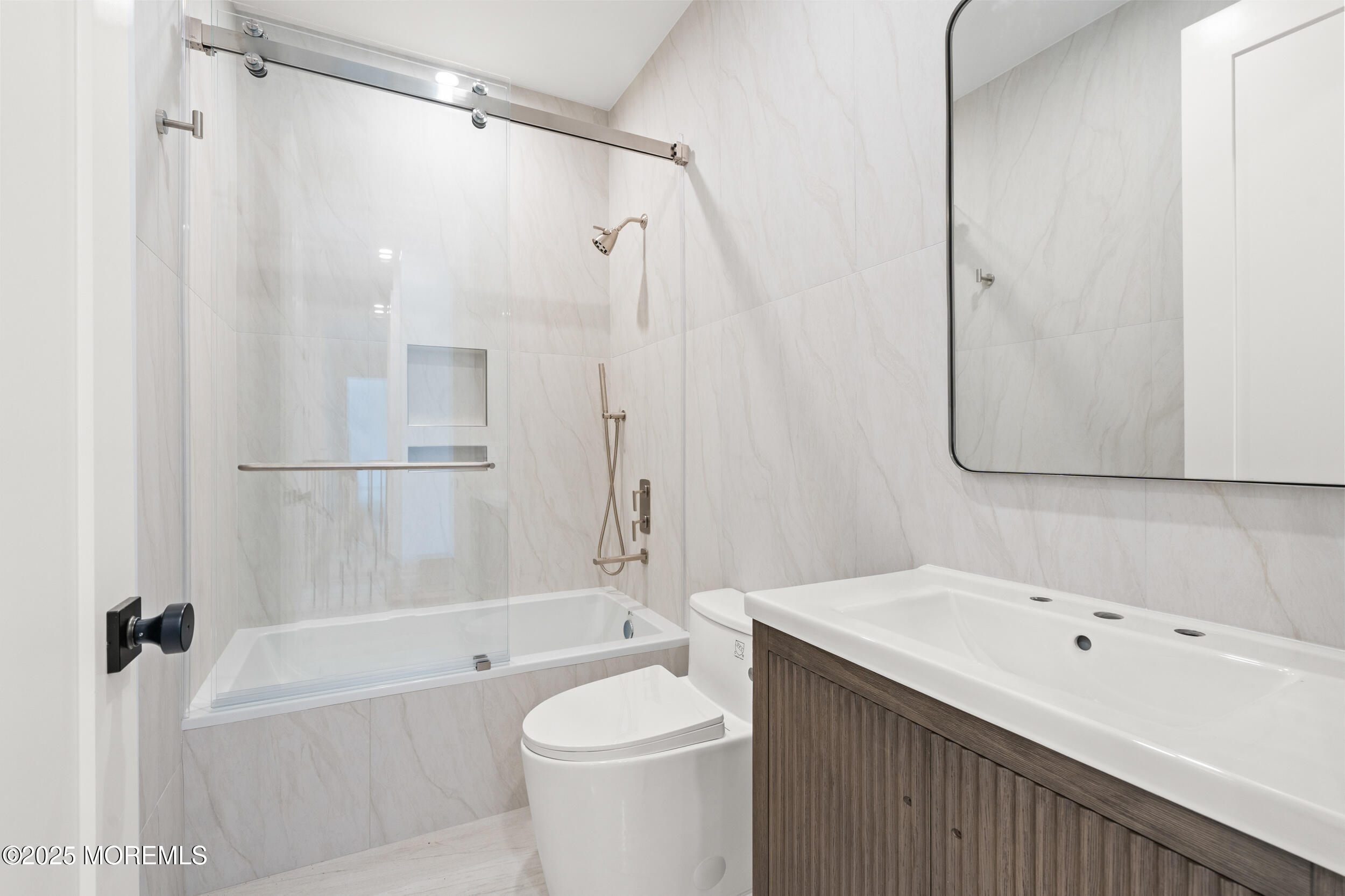 2 Deborah Place Oakhurst, NJ 07755 - Photo 34 of 82 a bathroom with a bathtub shower sink vanity and toilet