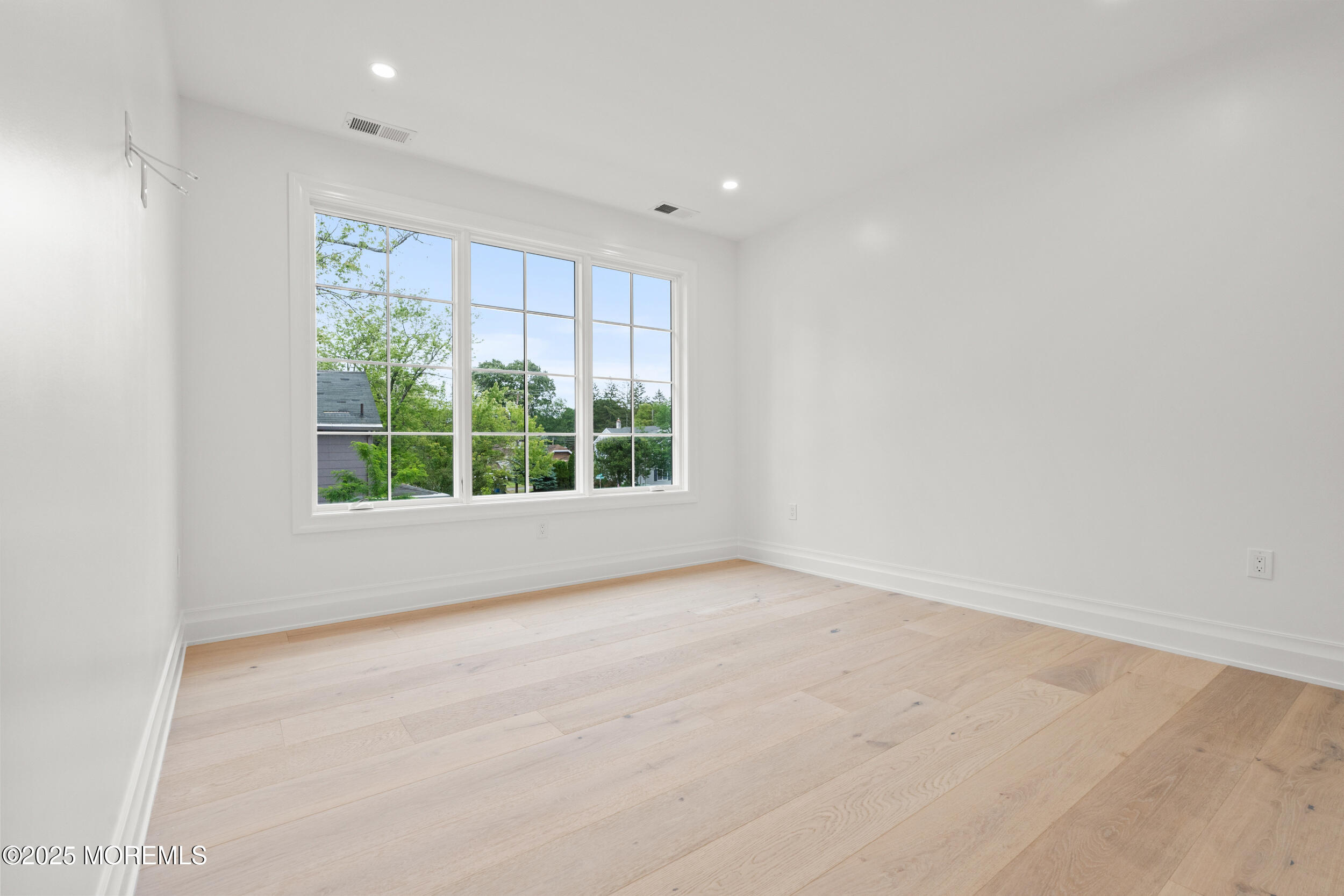 2 Deborah Place Oakhurst, NJ 07755 - Photo 37 of 82 a view of an empty room with a window