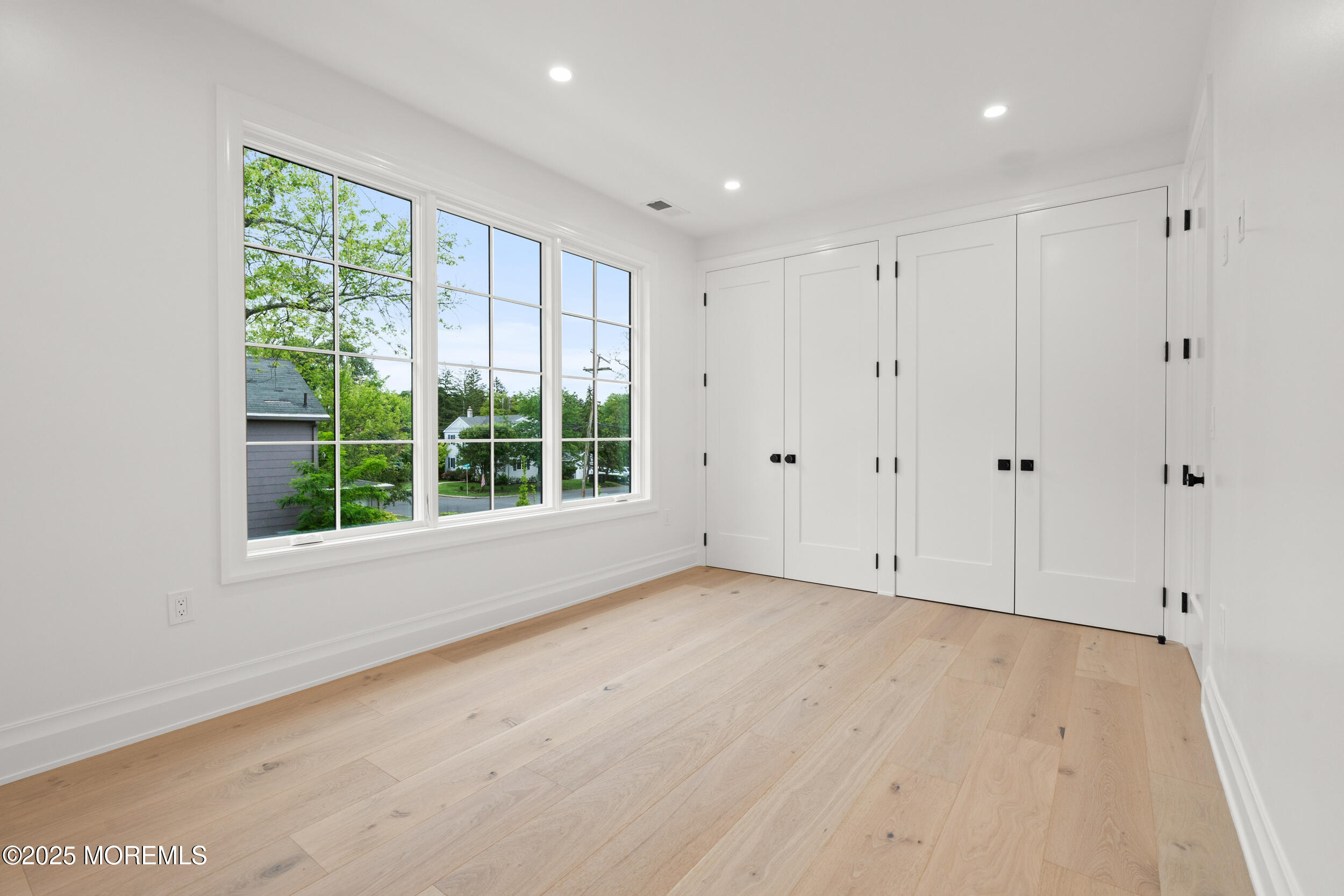 2 Deborah Place Oakhurst, NJ 07755 - Photo 42 of 82 a view of an empty room with a window
