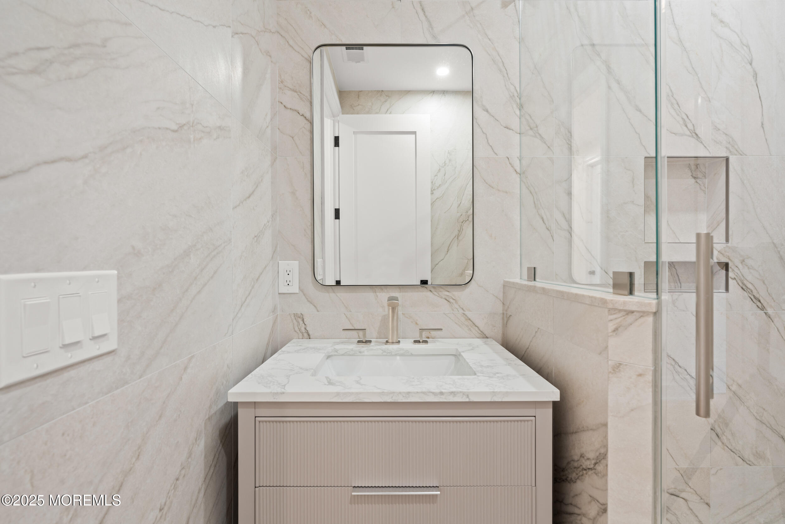2 Deborah Place Oakhurst, NJ 07755 - Photo 45 of 82 a bathroom with a sink and a mirror