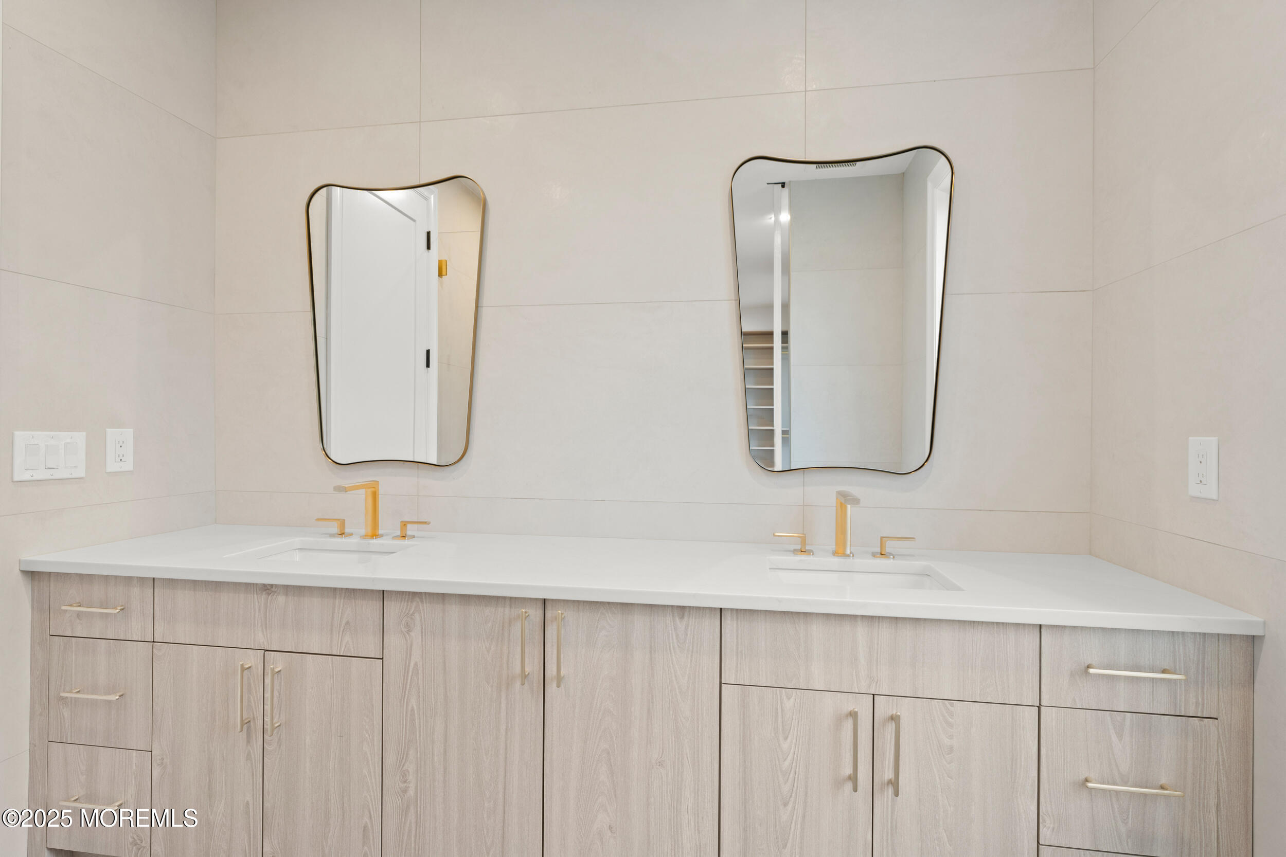 2 Deborah Place Oakhurst, NJ 07755 - Photo 61 of 82 a bathroom with double vanity sinks and a mirror
