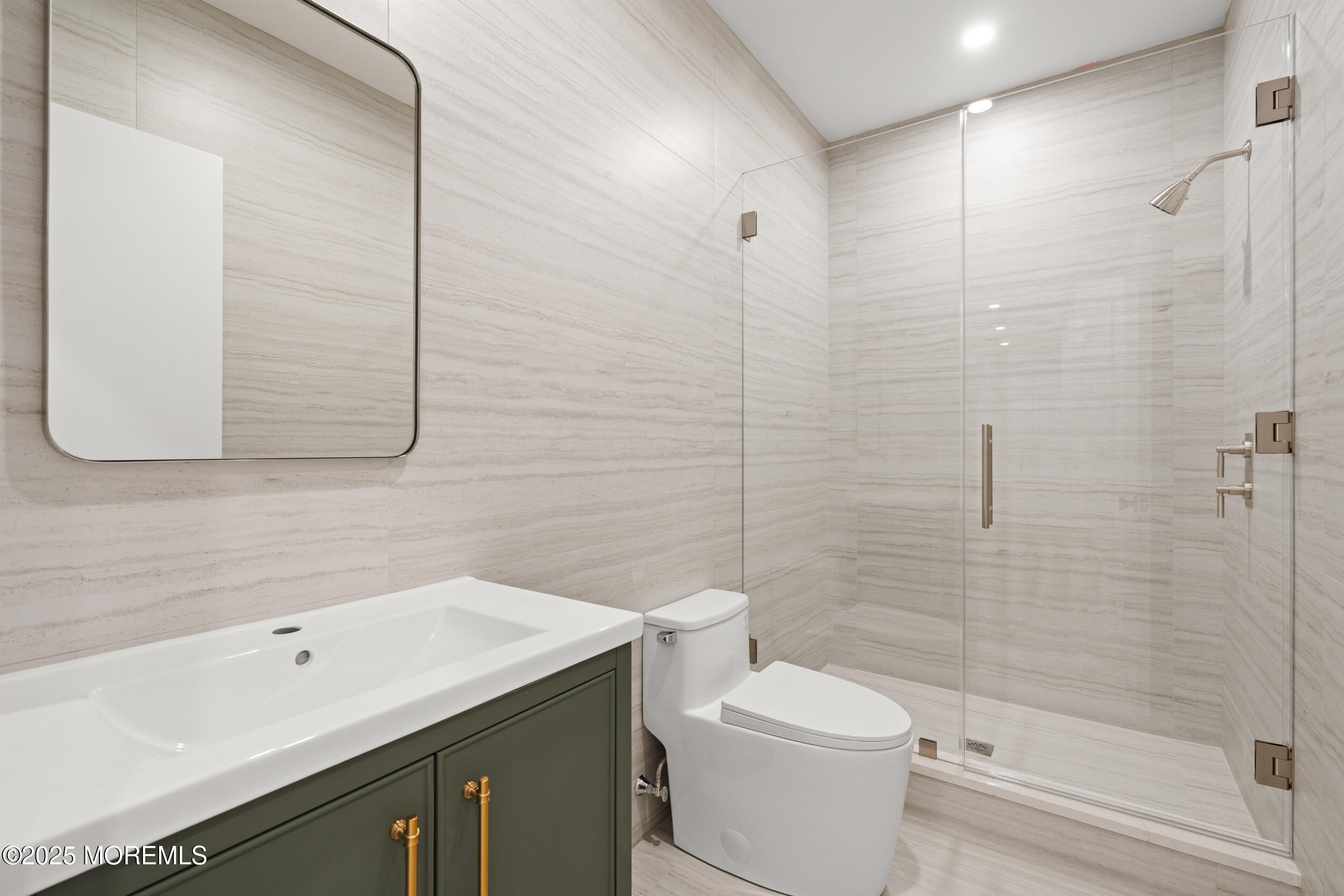 2 Deborah Place Oakhurst, NJ 07755 - Photo 66 of 82 a bathroom with a sink a toilet and shower