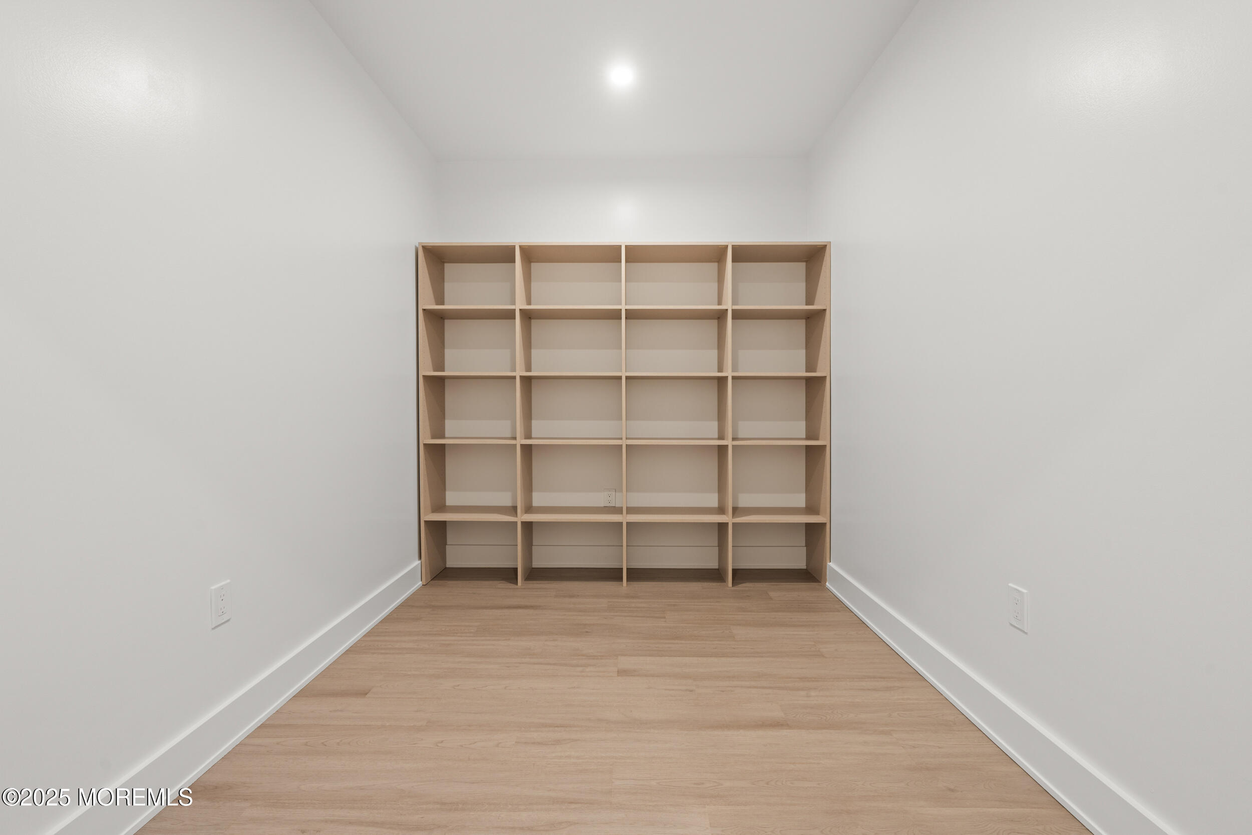 2 Deborah Place Oakhurst, NJ 07755 - Photo 67 of 82 a view of a room with wooden floor and shelf