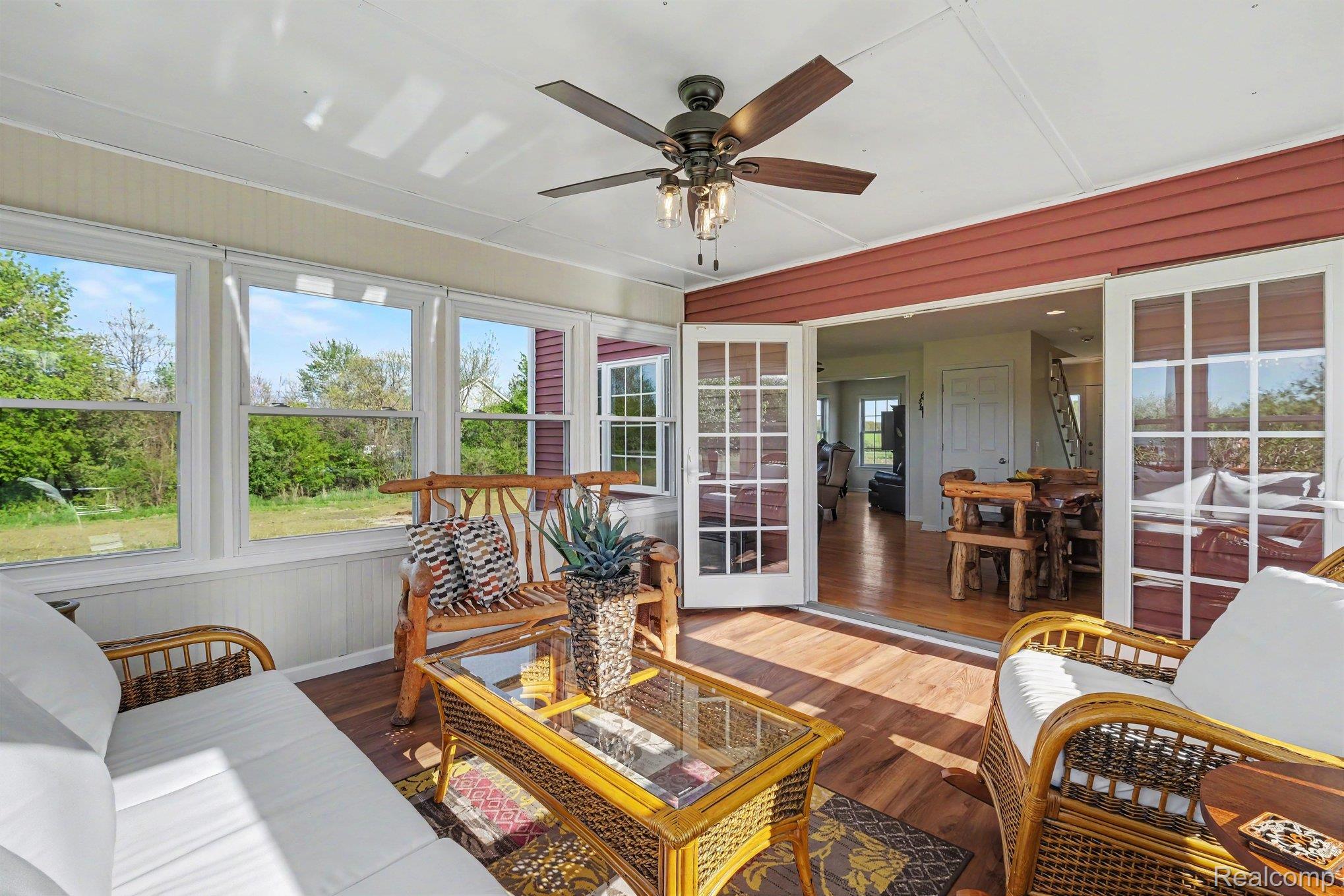 6520 Cook Road Swartz Creek, MI 48473 - Photo 18 of 43 Sunroom / solarium featuring wood finished floors