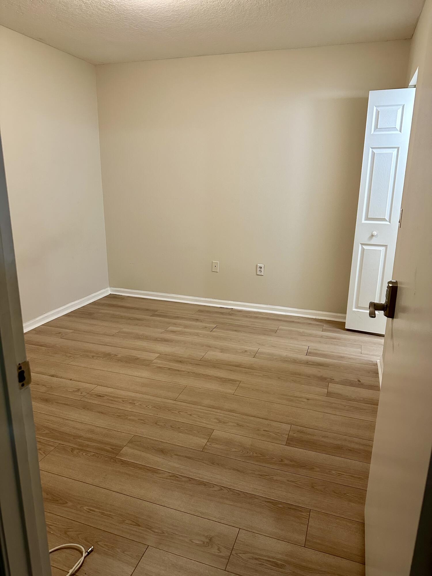3810 North Jog Road, Unit 105 Royal Palm Beach, FL 33411 - Photo 12 of 26 a view of an empty room